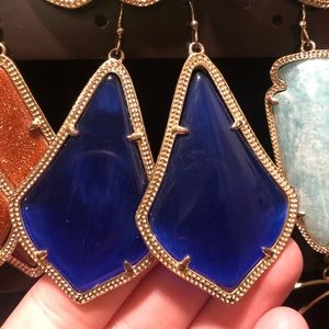 Blue Kendra Scott earrings. The bigger size.